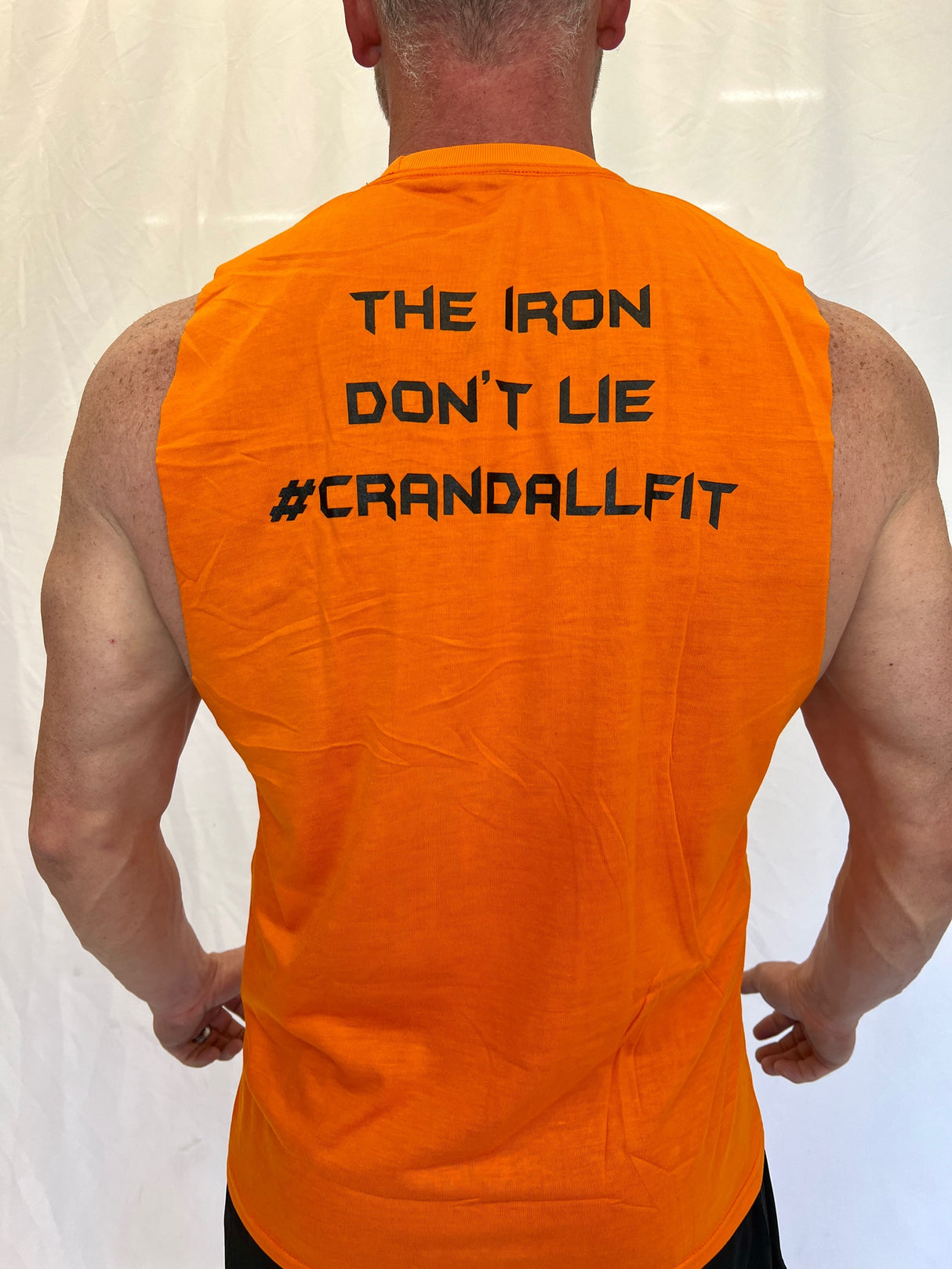 CF Orange Sleeveless "Iron Don't Lie" Tee